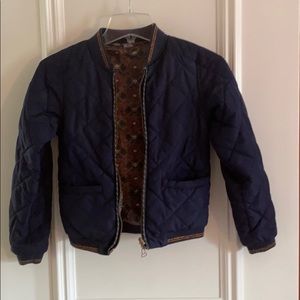 Girls blue reversible jacket.